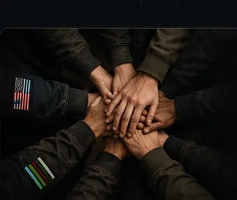 Community members placing their hands together